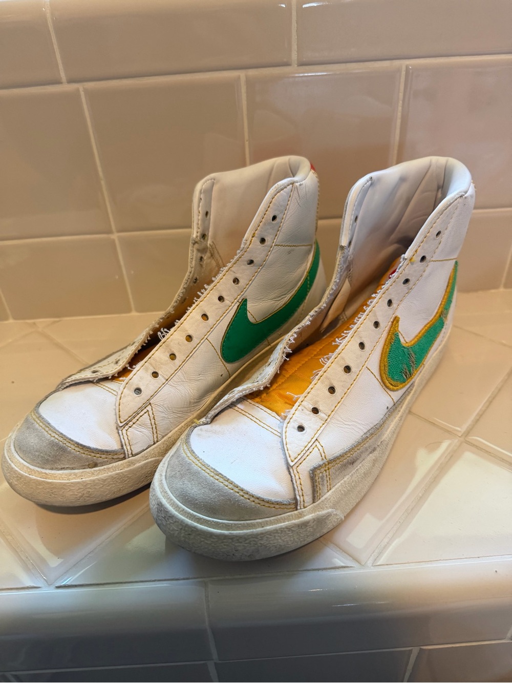 Nike Kids White High-Top Sneakers with Red, Green and Gold Accents
